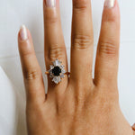 DECORA | Round Black Center Stone & White Diamond Halo Ring