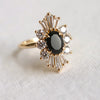 DECORA | Oval Black Center Stone & White Diamond Halo Ring
