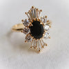 DECORA | Oval Black Center Stone & White Diamond Halo Ring