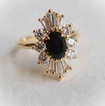 DECORA | Oval Black Center Stone & White Diamond Halo Ring