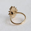 DECORA | Oval Black Center Stone & White Diamond Halo Ring