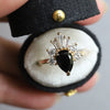 DECORA | Pear Black Center Stone & White Diamond Ring