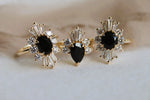 DECORA | Oval Black Center Stone & White Diamond Halo Ring