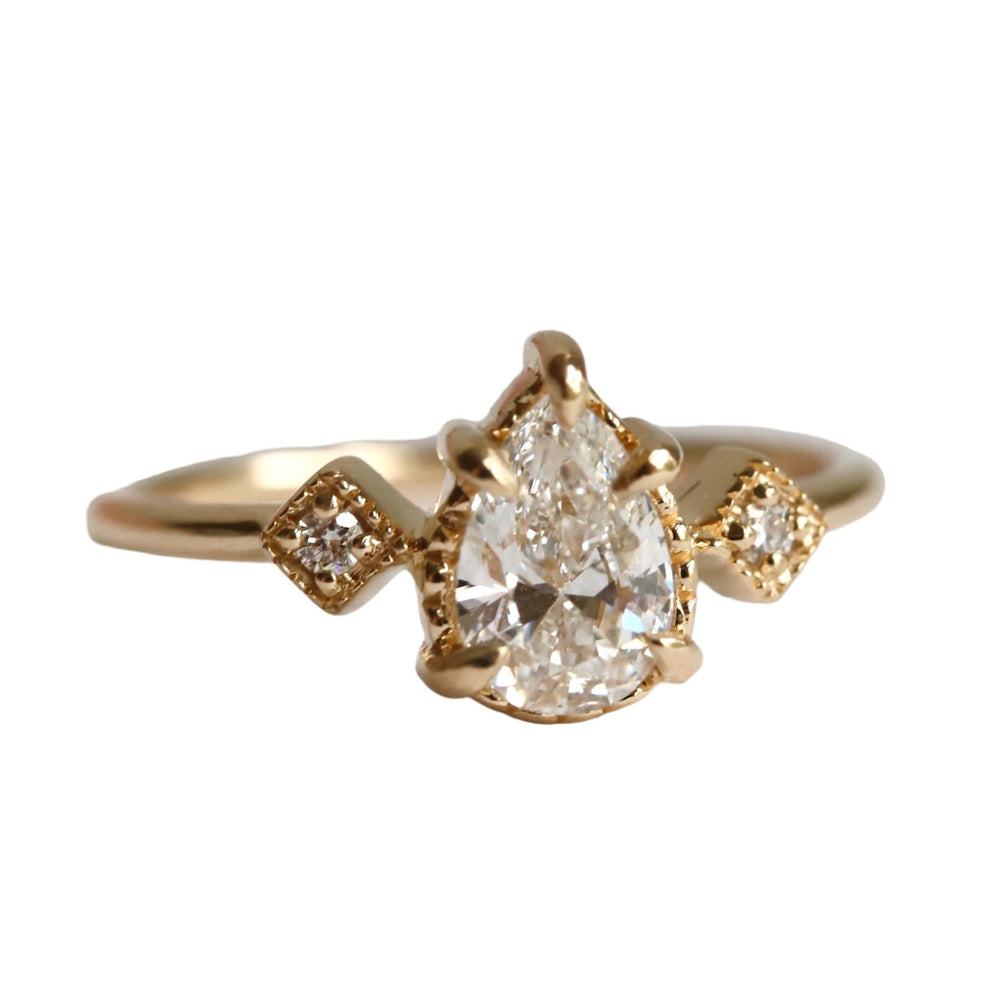 Cara | 0.7 ct. Pear Diamond Triple Station Ring