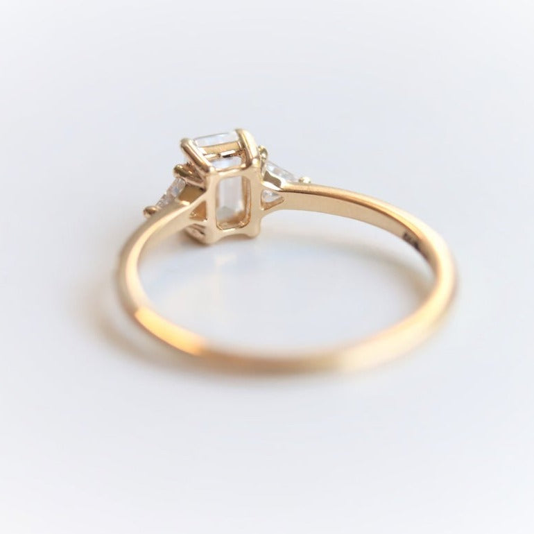 Alexis | 14K Emerald Cut Moissanite & Triangle Moissanite Ring - Emi Conner Jewelry 