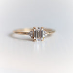Alexis | 14K Emerald Cut Moissanite & Triangle Moissanite Ring - Emi Conner Jewelry 