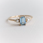 EVA | 14K Emerald Cut Aquamarine and Pearl Side Stone Ring - Emi Conner Jewelry 