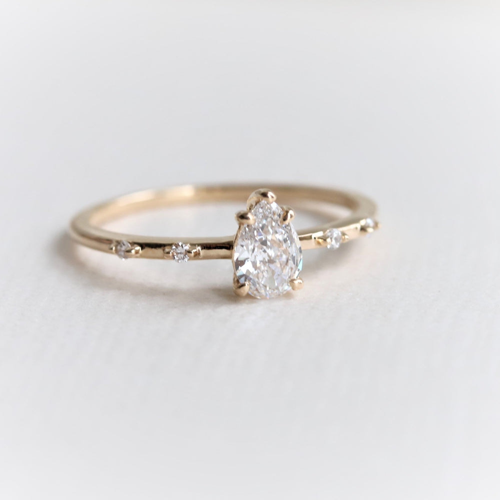 Aurora | Pear Cut Diamond Accented Ring