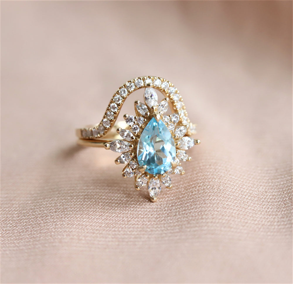 Lana | Pear Sky Blue Topaz Halo Ring