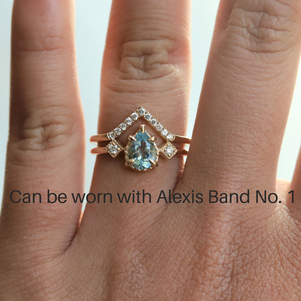 Cara | 0.7 ct. Pear Diamond Triple Station Ring