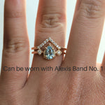 Cara | 0.7 ct. Pear Diamond Triple Station Ring