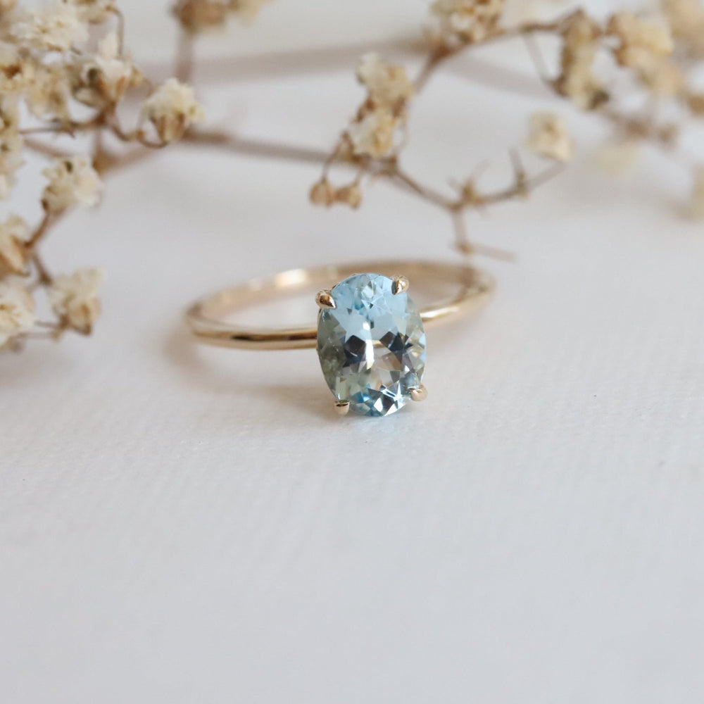Fleur De Lis | 1 ct. Oval Aquamarine Solitaire Ring