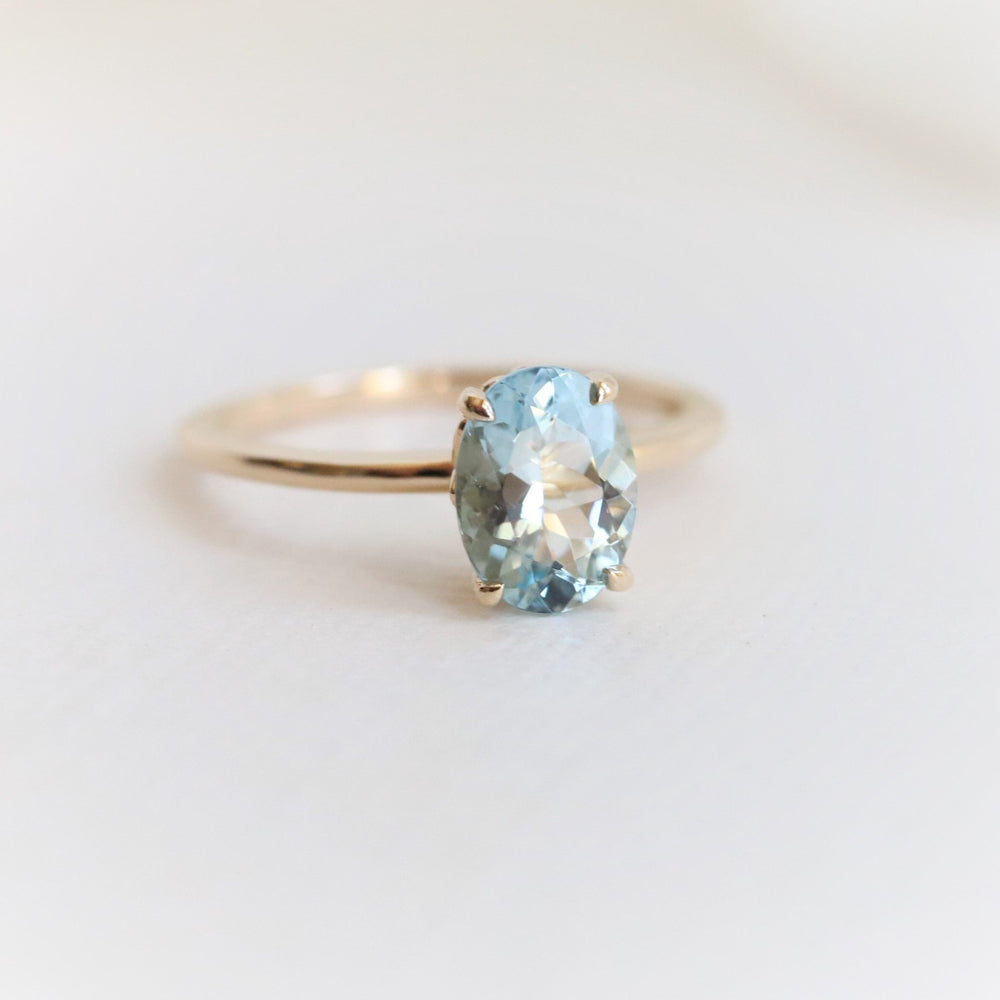Fleur De Lis | 1 ct. Oval Aquamarine Solitaire Ring