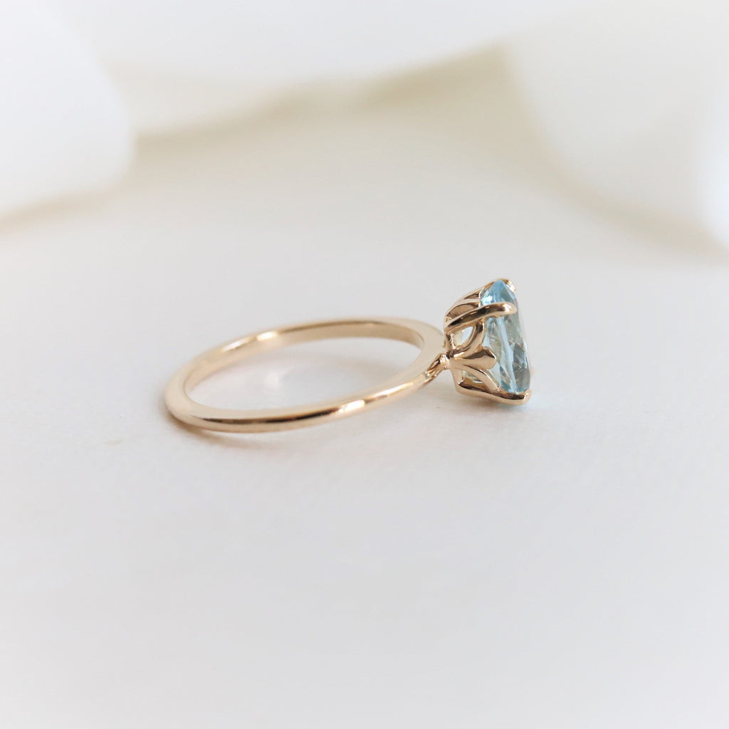 Fleur De Lis | 1 ct. Oval Aquamarine Solitaire Ring – Emi Conner Jewelry
