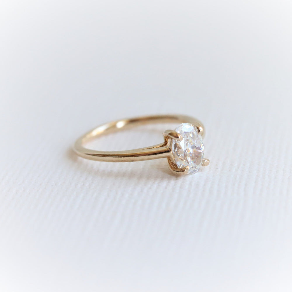 AVA | 0.8 ct Oval Dainty Cathedral Solitaire Ring