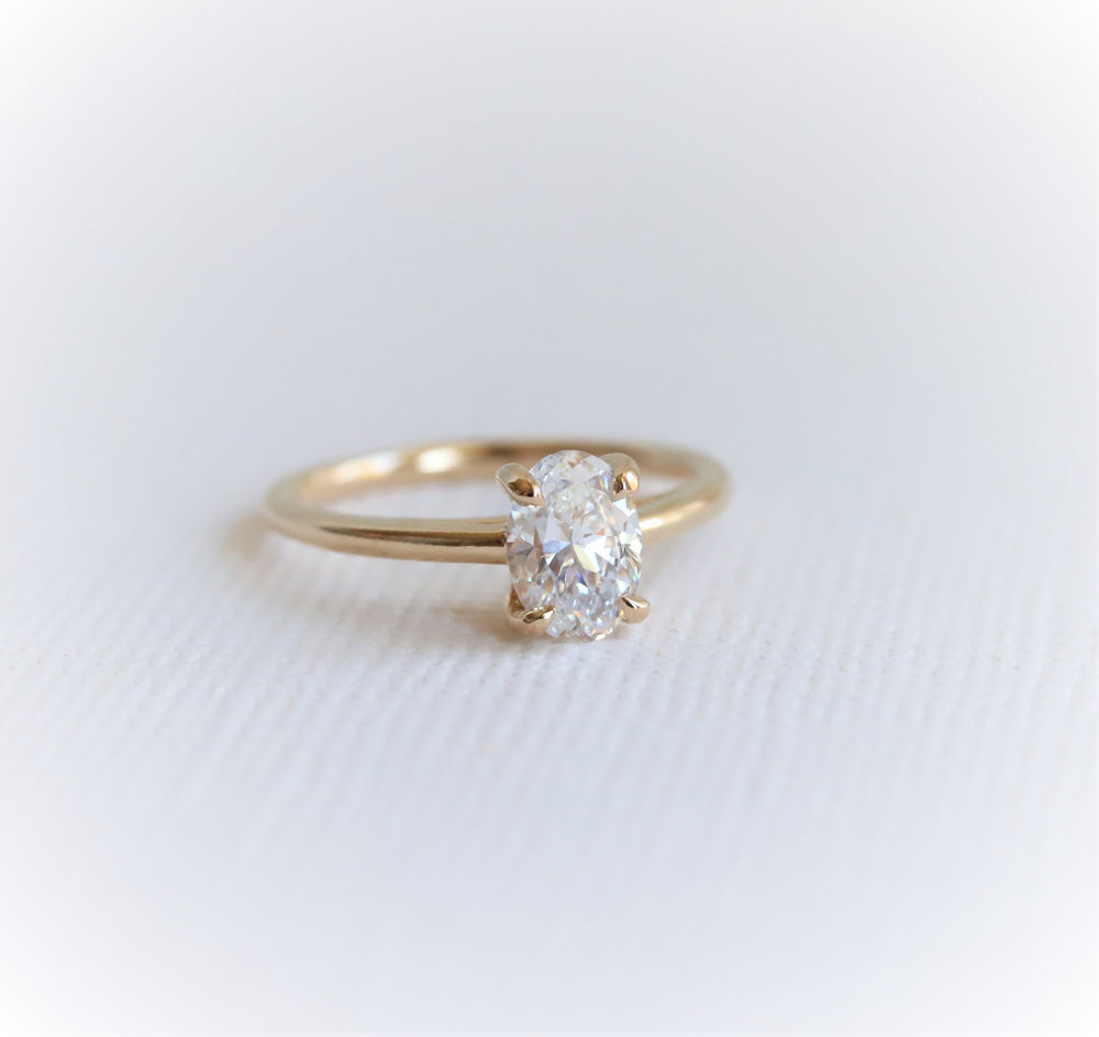 AVA | 0.8 ct Oval Dainty Cathedral Solitaire Ring